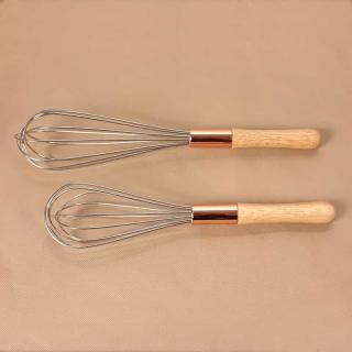 Egg beater with wooden handle